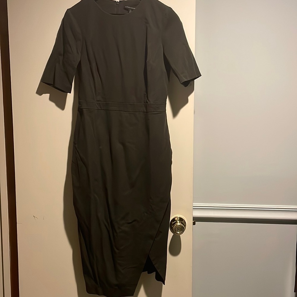 Olive green short sleeve dress, mid calf. Stretchy spandex cotton.